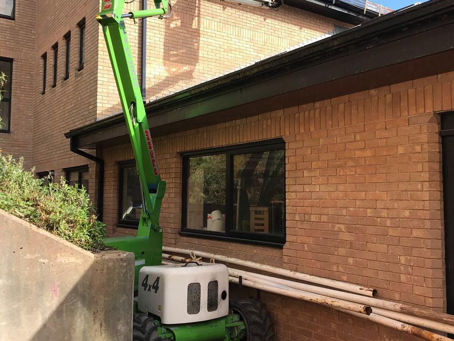 Access platform in use on a commercial roofing job