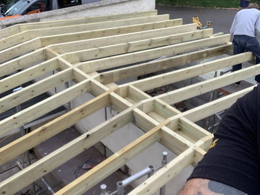 New timber joists and deck laid on a flat roof